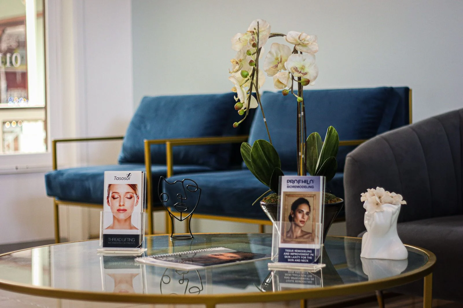 The OPTIONS lounge, with blue seating and natural light